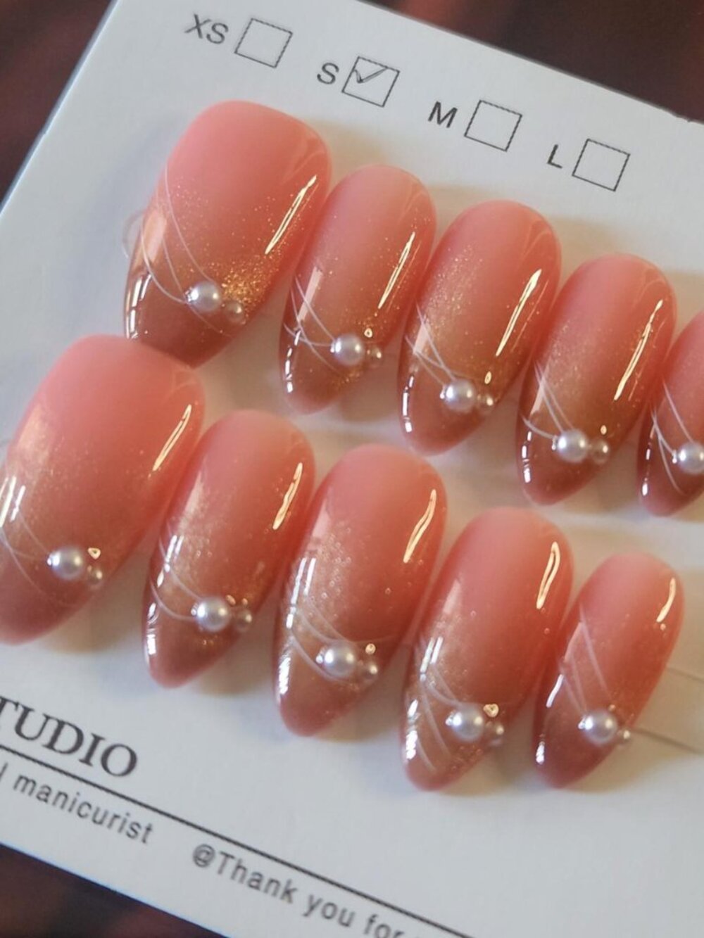 Pink with gold tip short-medium 2.5cm almond press-on nails  pearls. Size Small.